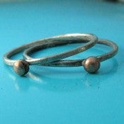 Image of Unique sterling silver stacking rings with bronze pebbles