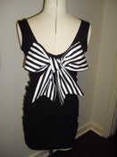Image of Slinky Suzy Bow singlet dress.