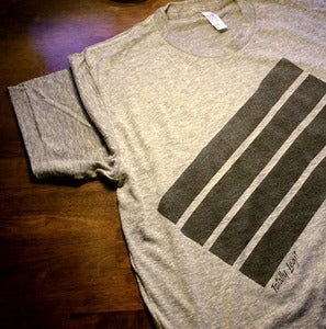 Image of Four Stripe Tee