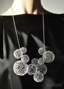 Image of silver bubble neckpiece