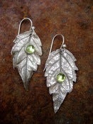 Image of Silver leaf replica earrings with peridot