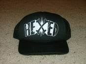 Image of HEXED BLACK TRUCKER HAT