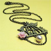 Image of Escaping The Cage - Bronze Pink and Cream Bird Necklace with Flower and Pearl