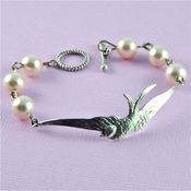 Image of In Flight - Antiqued Silver and Cream Swarovski Pearl Bird Bracelet
