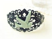 Image of Black Filigree Cuff with Mint Green Swallow