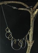 Image of Overlapping Silver and Gold Circle Necklace