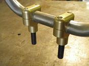 Image of Springer risers in brass