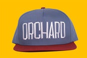 Image of Orchard Snapback Hat - Postal Blue Sherman Text Logo