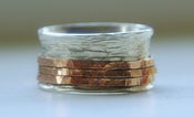 Image of Unique Wedding Ring: Rustic Sterling Silver and 14k rose gold fill wide spinner ring