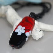 Image of Red Swirl on Black with Daisies Lampwork Pendant