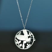 Image of Butterfly Hovering over Flowers Pendant