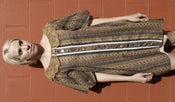 Image of Flutter sleeve Floral stripe dress with buttons all the way down the front and a mustard yellow lace