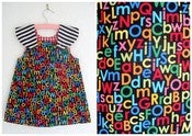 Image of black alphabet dress for age 1-2yrs