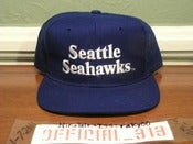 Image of VINTAGE SEATTLE SEAHAWKS TEXT NEW ERA SNAPBACK CAP HAT