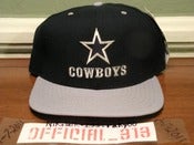 Image of VINTAGE DALLAS COWBOYS LOGO TEXT NEW ERA SNAPBACK CAP HAT