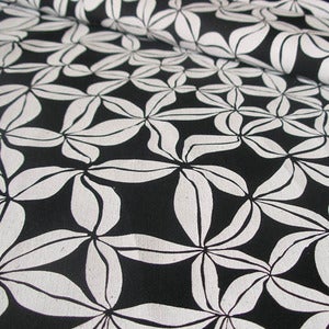 Image of Bauhinia white on black hemp/cotton