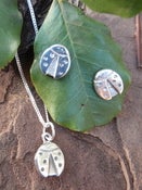 Image of ladybug earrings and matching pendant