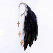 Image of Ear cuff with black rooster feathers and 3 silver coloured crosses