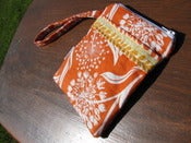 Image of Orange/White Wristlet with Decorative Stripe