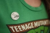 Image of JCM Button