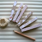Clothes-pegs and string