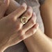 Image of sterling silver and 18k gold karma ring