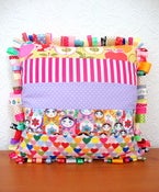 Image of ribbon cushion