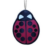 Image of Ltd. Edition Ladybug Necklace made from recycled vinyl records.