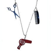 Image of Salon Themed Charm Necklace made from recycled vinyl records.