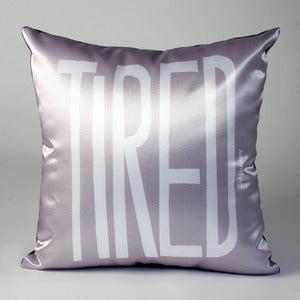 Image of TIRED Pillow (white on gray)