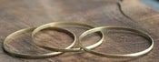 Image of 3 Skinny round brass bracelet