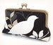 Image of Bird on a branch clutch bag