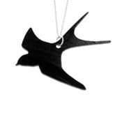 Image of Swallow Necklace/Earrings made from a recycled vinyl record.