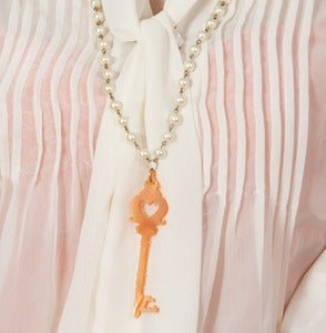 Image of Magical Key in Peach on Long Pearls - made with magical silk effect acrylic!