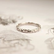 Image of platinum 2.5mm floral carved