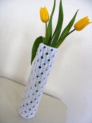 Image of handknit lace vase cosy in white