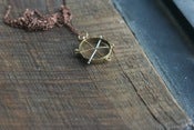 Image of Brass wheel pendant