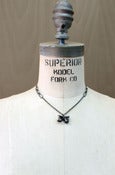 Image of Small Sterling Silver Bow Necklace