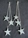 Image of leather star earrings