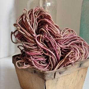 Image of cider. corespun merino tencel yarn.