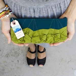 Image of -- S O L D O U T -- a roundy-bottomed tough ruffles zipper purse in peacock + avocado