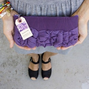 Image of -- S O L D O U T -- a roundy-bottomed tough ruffles zipper purse in lavender