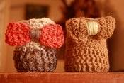 Image of one little pot handmade with wooL