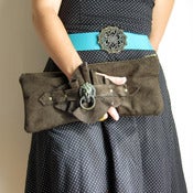 Image of Brown Leather Wrist Clutch with Lion's Head