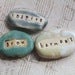 Image of word beads: GROW INSPIRE HARMONY