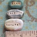 Image of word beads: GROW INSPIRE HARMONY