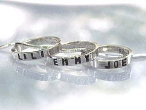 Image of personalized sterling silver baby rings necklace (includes 3 rings and 18" chain)