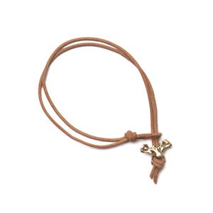 Image of 14k gold single vertebrae on natural leather bracelet (B0114k)