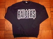 Image of VINTAGE L.A. RAIDERS BLACK & SILVER SWEATSHIRT