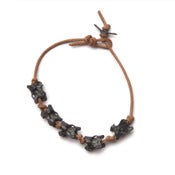 Image of 7" five oxidized silver vertebrae knotted on wax-coated cotton bracelet (B06sil)